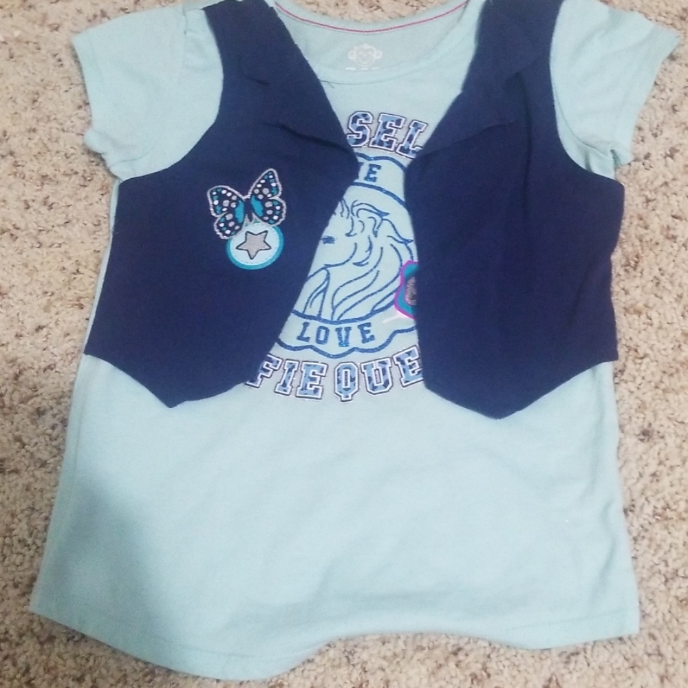 A kids shirt with an attached vest
